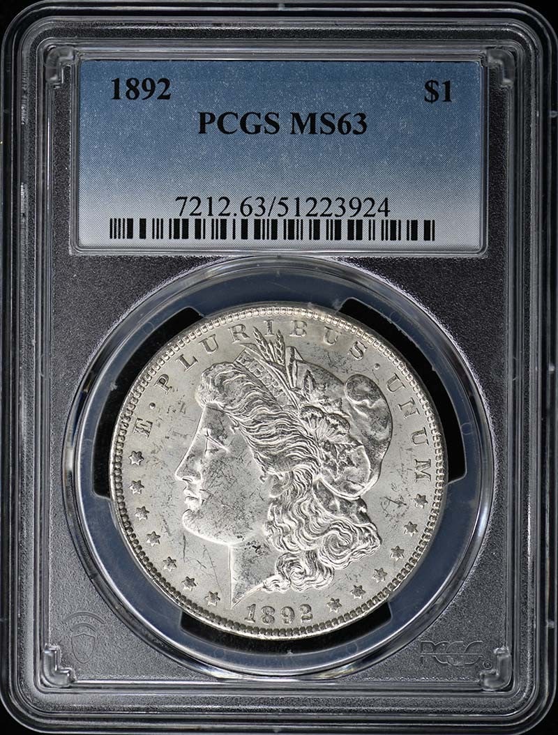 1892 Morgan Dollar PCGS MS63 Uncirculated Philadelphia Mint: 1892 Morgan Dollar PCGS MS63 Uncirculated Philadelphia Mint This 1892 Morgan Dollar is certified by PCGS with a grade of MS63, indicating its uncirculated condition. It was minted in Philadelphia and 