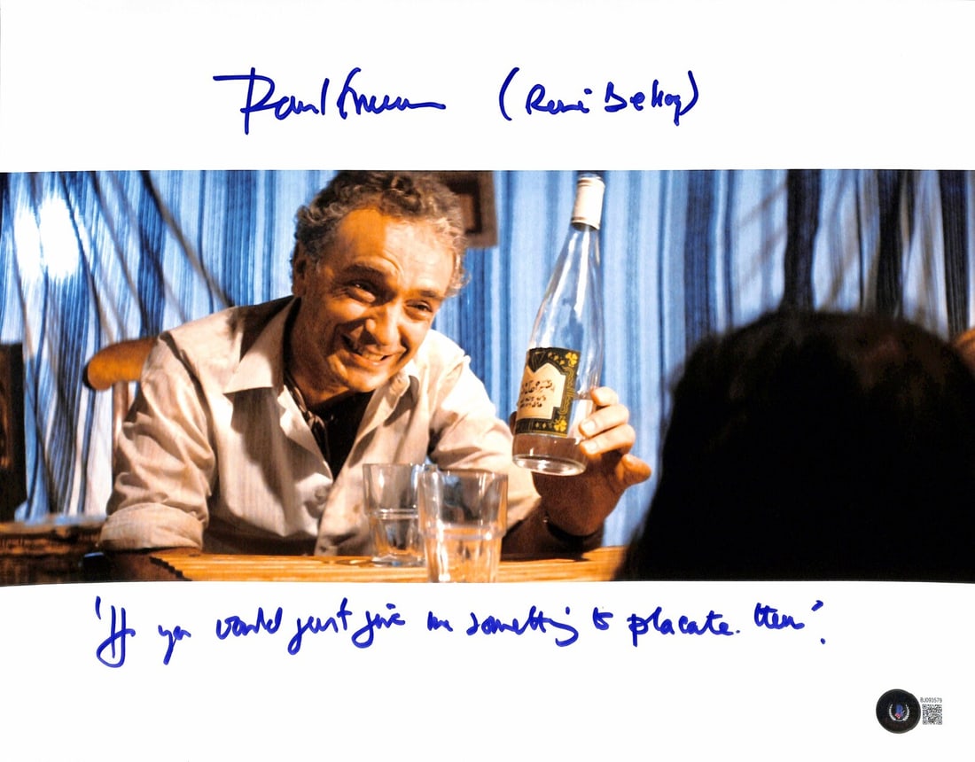 Paul Freeman Autographed 11x14 Photo as Beloq from Raiders Beckett Certified: Paul Freeman Autographed 11x14 Photo as Beloq from Raiders Beckett Certified This is an original 11x14 inch color photograph signed and inscribed by Paul Freeman, who portrayed Rene Beloq in "Indiana 