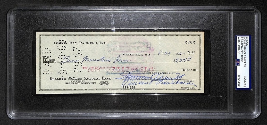 1960 Green Bay Packers Bank Check Signed by Vince Lombardi and Dominic Olejniczak PSA/DNA: 1960 Green Bay Packers Bank Check Signed by Vince Lombardi and Dominic Olejniczak PSA/DNA This is an original 1960 bank check from the Green Bay Packers, dual-signed by Vince Lombardi and Dominic Olej