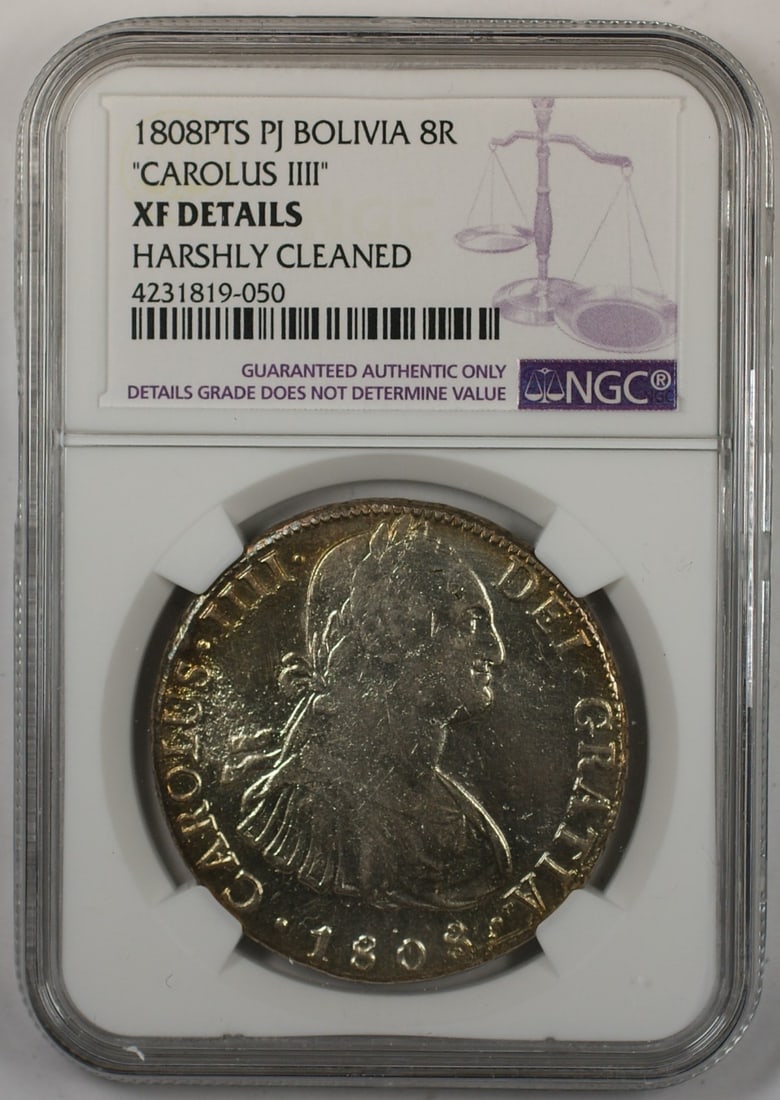 NGC XF Details 1808 Bolivia 8 Reales Silver Coin Cleaned: NGC XF Details 1808 Bolivia 8 Reales Silver Coin Cleaned This 1808-PTS PJ Bolivia 8 Reales coin features King Carolus III and is composed of 0.896 fine silver. Certified by NGC with a grade of XF Deta