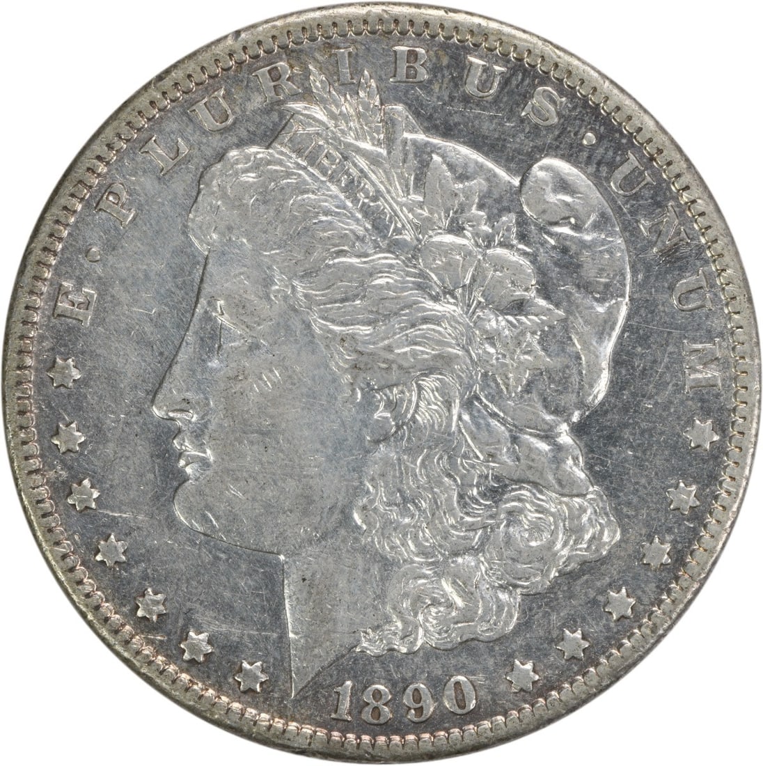 1890-CC Morgan Silver Dollar EF Uncertified George T Morgan Design: 1890-CC Morgan Silver Dollar EF Uncertified George T Morgan Design This is a 1890-CC Morgan Silver Dollar, a classic piece of American numismatics. The coin features a design by George T. Morgan and i