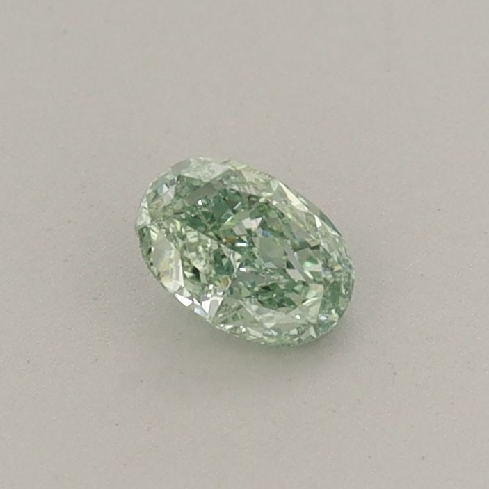 Loose Diamond - OVAL 0.23ct Fancy Vivid Green VS2: Loose Diamond - OVAL 0.23ct Fancy Vivid Green VS2 Source: This is a real non-mined Diamond that has been grown in a lab Shape: OVAL Carats: 0.23 Color: Fancy Vivid Green Certification: IGI Additional 
