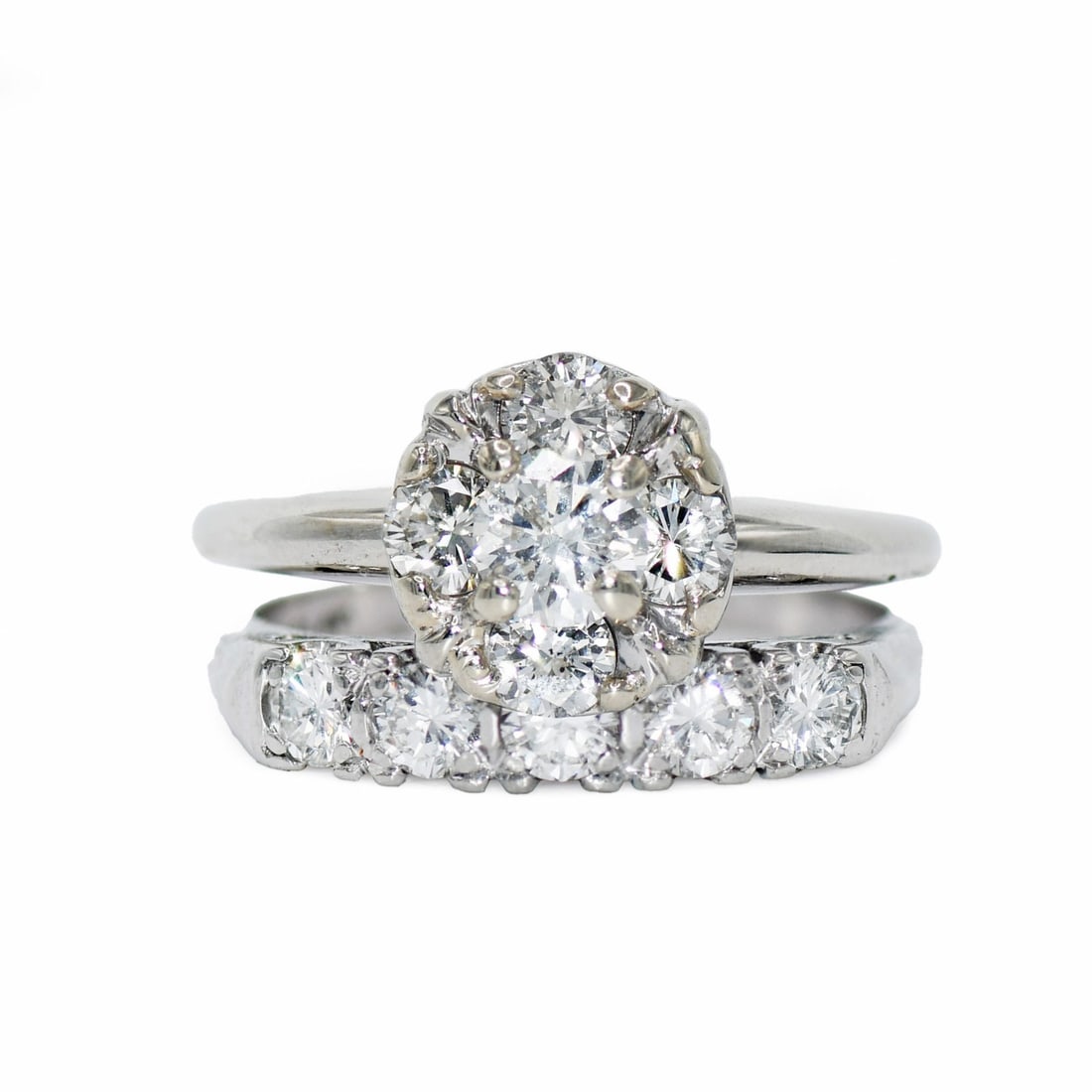Diamond Bridal Ring Set 14K White Gold Platinum Size 6.25: Diamond Bridal Ring Set 14K White Gold Platinum Size 6.25 This pre-owned engagement and wedding ring set features a combination of 14K white gold and platinum. The set is designed with a cluster setti