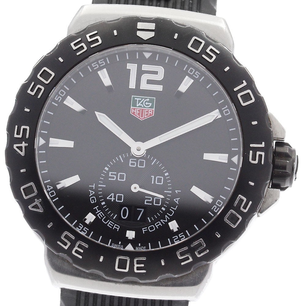 TAG Heuer Formula 1 Quartz Date Small Seconds 41mm Men's Watch: TAG Heuer Formula 1 Quartz Date Small Seconds 41mm Men's Watch This TAG Heuer Formula 1 Grand Date Quartz men's wristwatch features a stainless steel case paired with a black rubber strap. The watch i