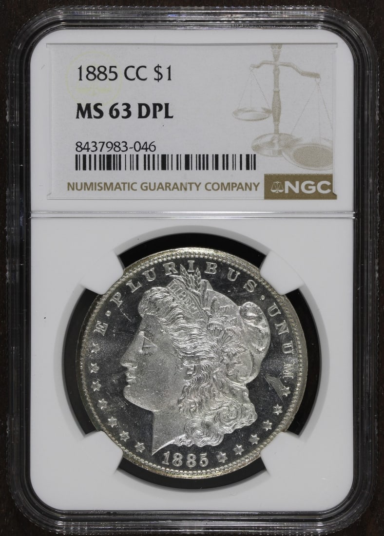 NGC MS63 DMPL Carson City Morgan Silver Dollar 1885-CC: NGC MS63 DMPL Carson City Morgan Silver Dollar 1885-CC This 1885-CC Morgan Silver Dollar is an uncirculated coin graded MS63 Deep Mirror Proof-Like (DMPL) by NGC. Featuring stunning cameo mirrors, it 