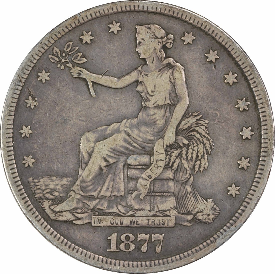 1877-S Trade Silver Dollar VF by William Barber Circulated: 1877-S Trade Silver Dollar VF by William Barber Circulated This 1877-S Trade Silver Dollar is a remarkable piece of numismatic history. Featuring a design by William Barber, this coin showcases the cl