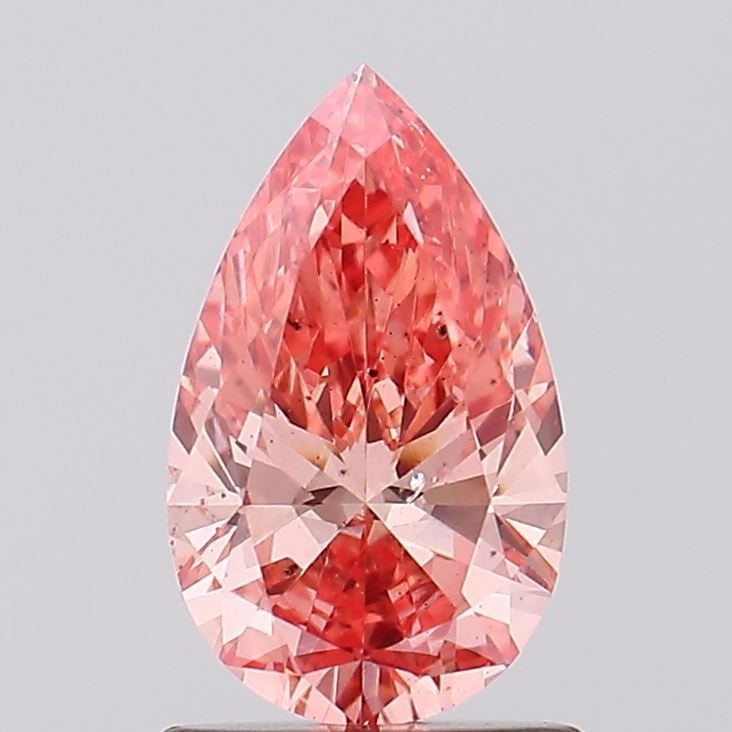 Loose Diamond - PEAR 1.02ct Fancy Vivid Pink SI1: Loose Diamond - PEAR 1.02ct Fancy Vivid Pink SI1 Source: This is a real non-mined Diamond that has been grown in a lab Shape: PEAR Carats: 1.02 Color: Fancy Vivid Pink Certification: IGI Video: