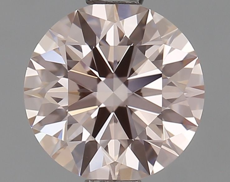 Ideal Loose Diamond - ROUND 1.09ct Fancy Pink VVS2: Ideal Loose Diamond - ROUND 1.09ct Fancy Pink VVS2 Source: This is a real non-mined Diamond that has been grown in a lab Shape: ROUND Carats: 1.09 Color: Fancy Pink Certification: IGI Video: