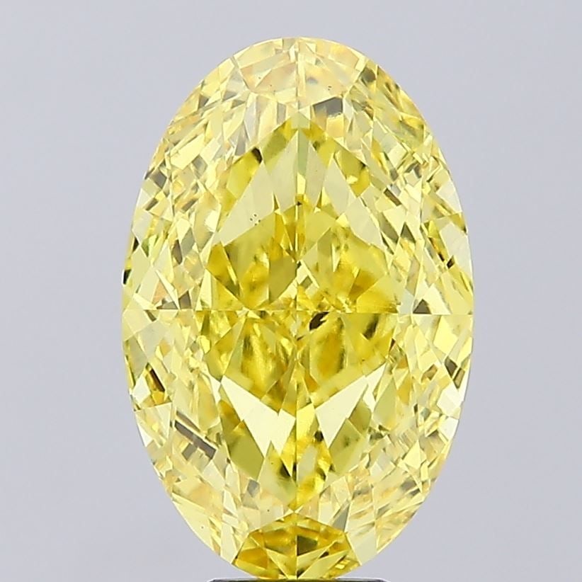 Loose Diamond - OVAL 9.51ct Fancy Vivid Yellow VS1: Loose Diamond - OVAL 9.51ct Fancy Vivid Yellow VS1 Source: This is a real non-mined Diamond that has been grown in a lab Shape: OVAL Carats: 9.51 Color: Fancy Vivid Yellow Certification: IGI Video: