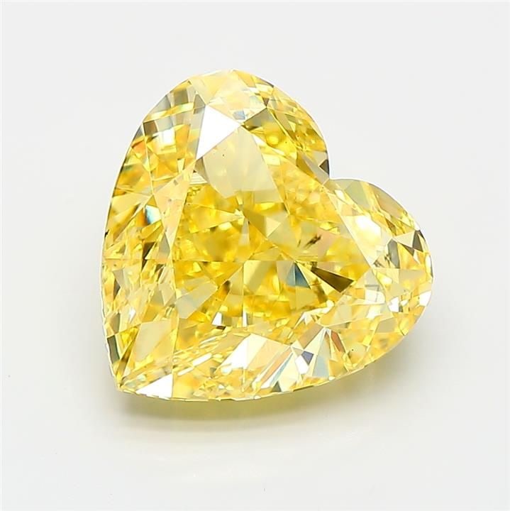 Loose Diamond - HEART 5.02ct Fancy Vivid Yellow VS2: Loose Diamond - HEART 5.02ct Fancy Vivid Yellow VS2 Source: This is a real non-mined Diamond that has been grown in a lab Shape: HEART Carats: 5.02 Color: Fancy Vivid Yellow Certification: IGI Video: