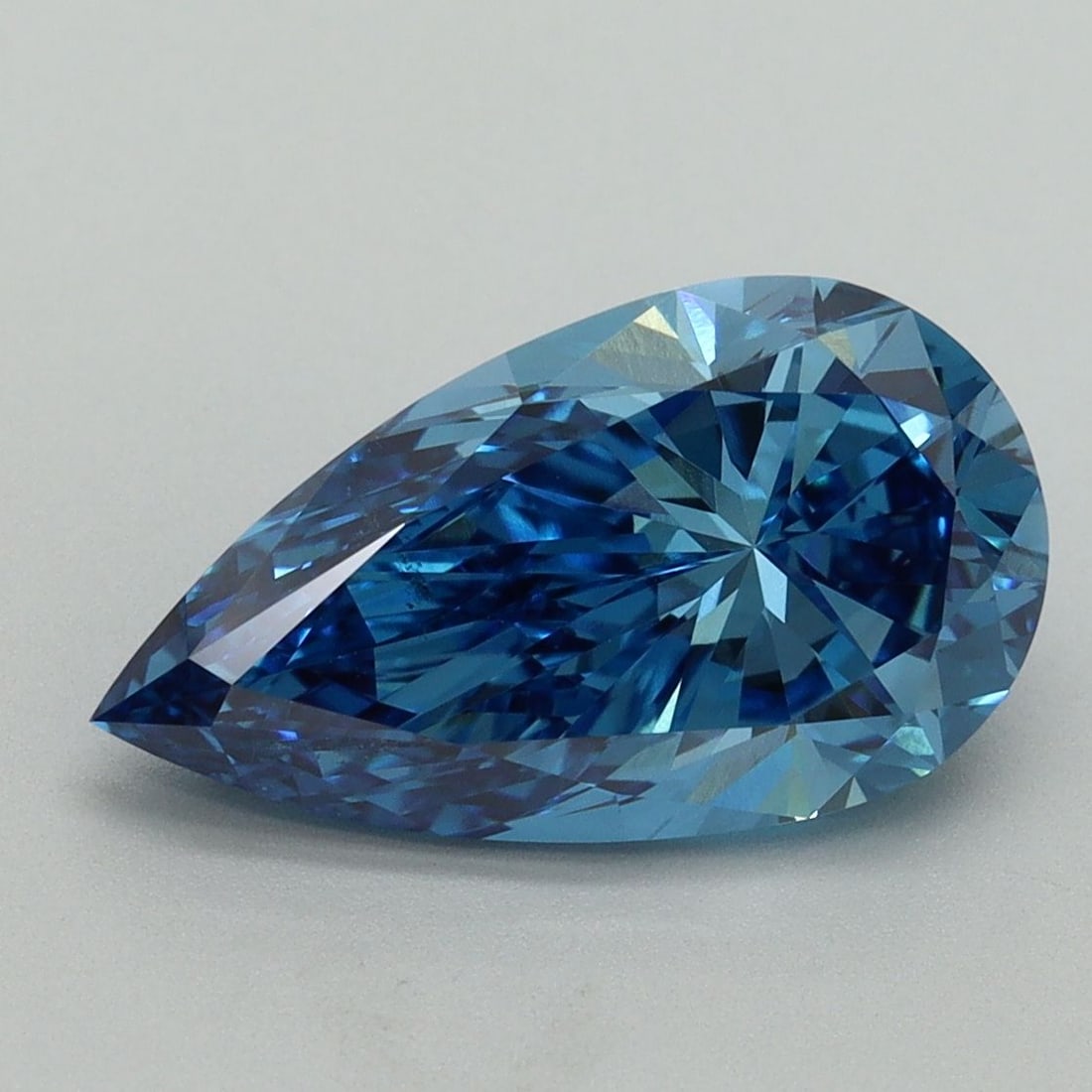 Loose Diamond - PEAR 3.0ct Fancy Vivid Blue VS2: Loose Diamond - PEAR 3.0ct Fancy Vivid Blue VS2 Source: This is a real non-mined Diamond that has been grown in a lab Shape: PEAR Carats: 3.0 Color: Fancy Vivid Blue Certification: IGI Video: