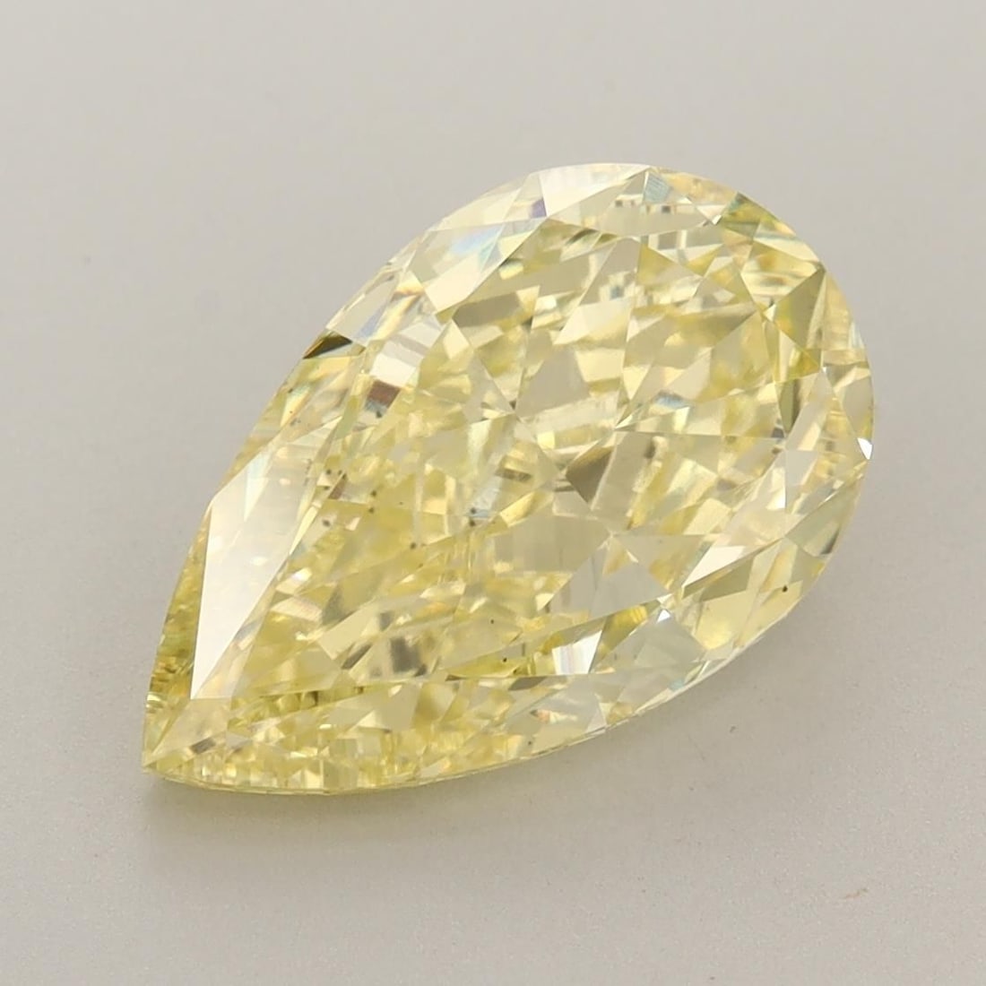 Loose Diamond - PEAR 4.12ct Fancy Vivid Yellow VS1: Loose Diamond - PEAR 4.12ct Fancy Vivid Yellow VS1 Source: This is a real non-mined Diamond that has been grown in a lab Shape: PEAR Carats: 4.12 Color: Fancy Vivid Yellow Certification: IGI Video: