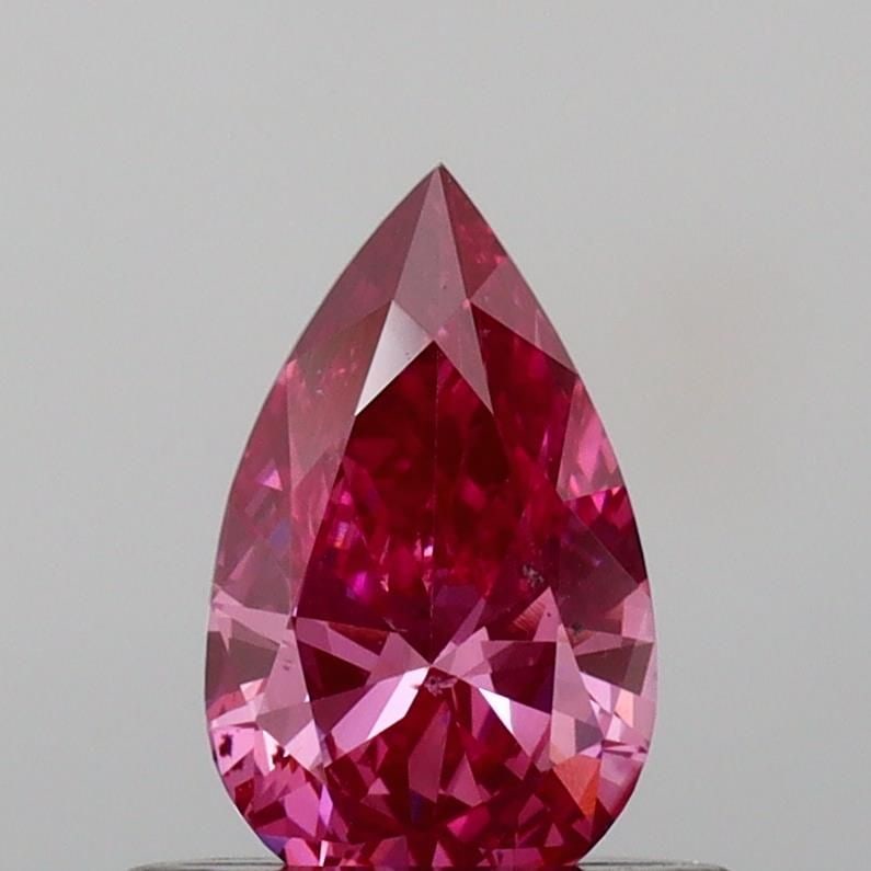 Loose Diamond - PEAR 0.49ct Fancy Vivid Pink SI1: Loose Diamond - PEAR 0.49ct Fancy Vivid Pink SI1 Source: This is a real non-mined Diamond that has been grown in a lab Shape: PEAR Carats: 0.49 Color: Fancy Vivid Pink Certification: IGI Video: