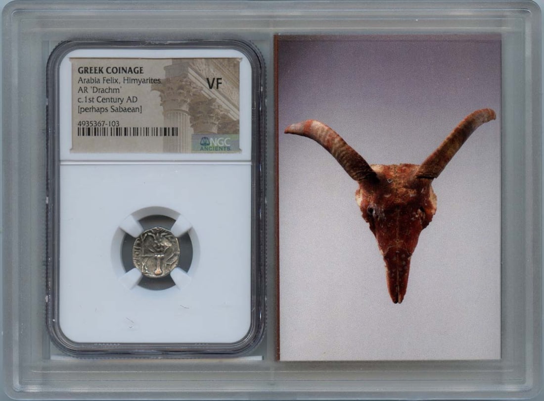 1st Century AD Himyarites AR Drachm NGC Certified VF20: 1st Century AD Himyarites AR Drachm NGC Certified VF20 This is an ancient Greek AR Drachm dating from the 1st century AD, originating from Arabia Felix, specifically the Himyarite Kingdom. The coin ha