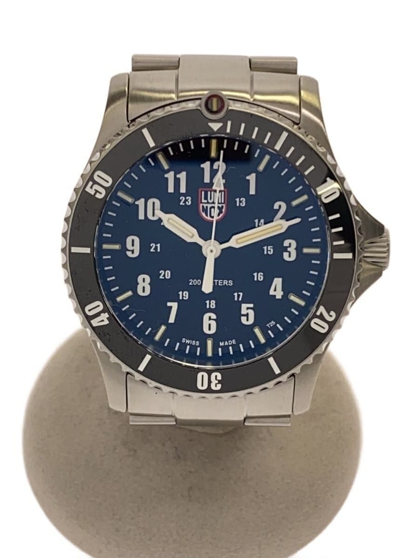 Luminox 30th Anniversary Black Stainless Steel Quartz Wristwatch: Luminox 30th Anniversary Black Stainless Steel Quartz Wristwatch This LUMINOX 30th Anniversary Sports Timer is a Swiss-made men's wristwatch featuring a quartz movement. The watch showcases a black st