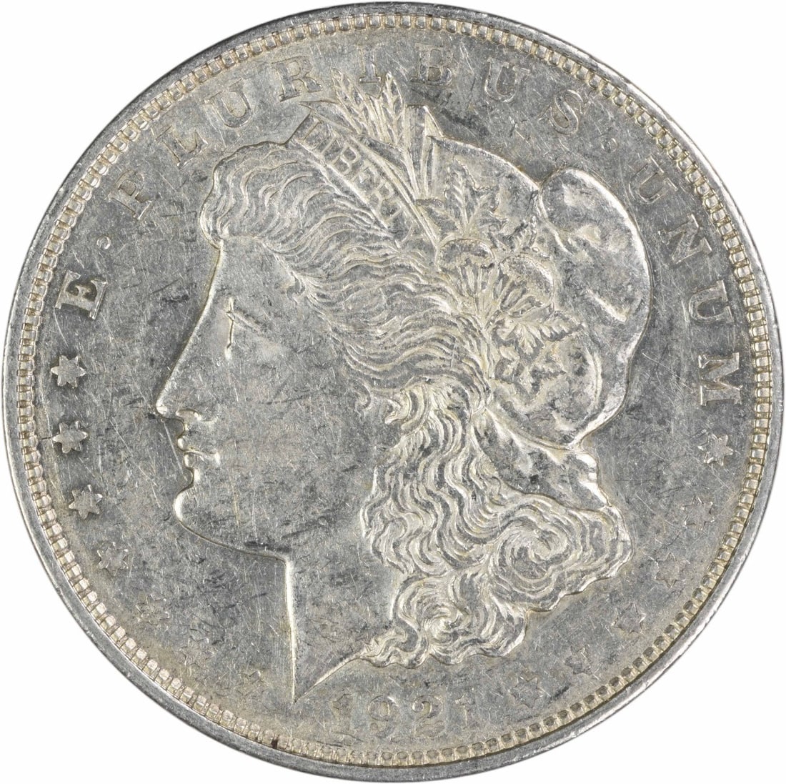 1921 Denver Morgan Dollar 90 Percent Silver AU Grade Uncertified: 1921 Denver Morgan Dollar 90 Percent Silver AU Grade Uncertified This is a 1921-D Morgan Silver Dollar struck at the Denver Mint and designed by George T. Morgan. Composed of 90% silver and 10% copper