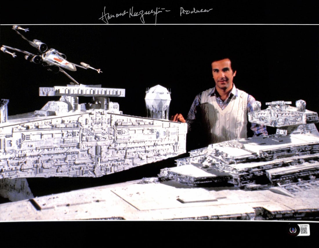 Howard Kazanjian Signed 11x14 Star Wars Photo Beckett Authenticated: Howard Kazanjian Signed 11x14 Star Wars Photo Beckett Authenticated This stunning 11x14 color photograph features the signature of Howard Kazanjian, the esteemed producer of Star Wars: Return of the J