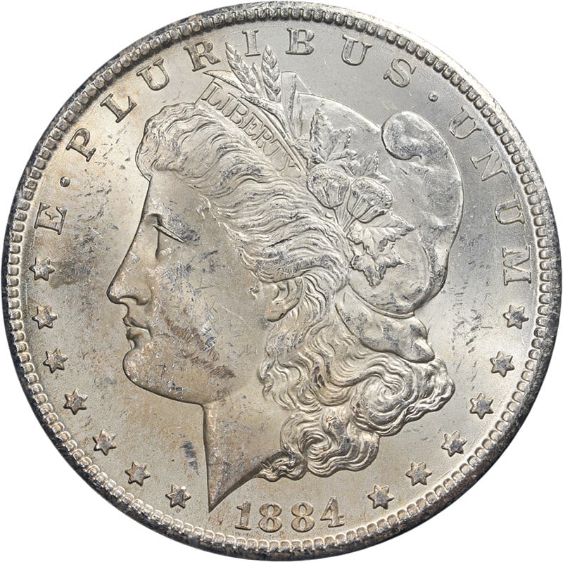 1884-CC GSA Morgan Silver Dollar CAC MS61 Uncirculated Coin: 1884-CC GSA Morgan Silver Dollar CAC MS61 Uncirculated Coin This 1884-CC GSA Morgan Silver Dollar is a stunning piece for collectors. Graded MS61 by CAC, it showcases excellent luster and a strong str