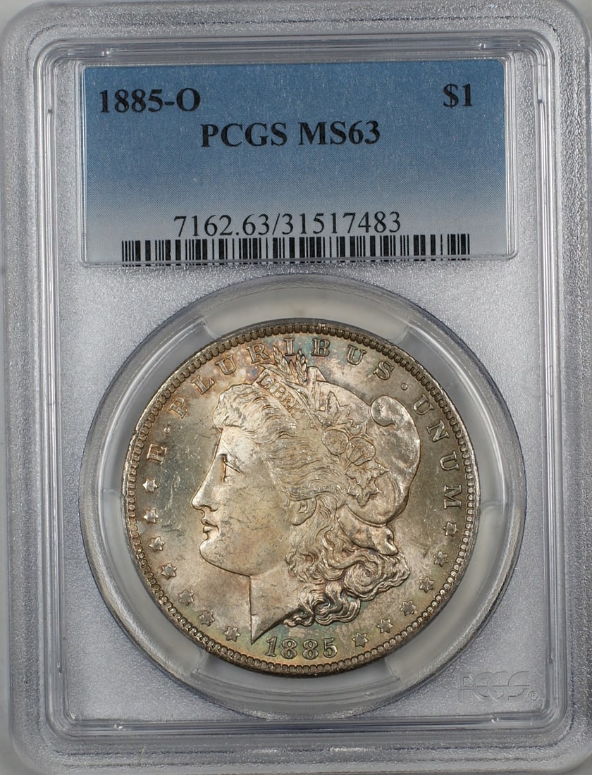 PCGS MS63 1885-O Silver Morgan Dollar with Attractive Toning: PCGS MS63 1885-O Silver Morgan Dollar with Attractive Toning This is an 1885-O Morgan Silver Dollar $1 coin from the New Orleans Mint, certified by PCGS with a grade of MS 63. The coin is composed of 