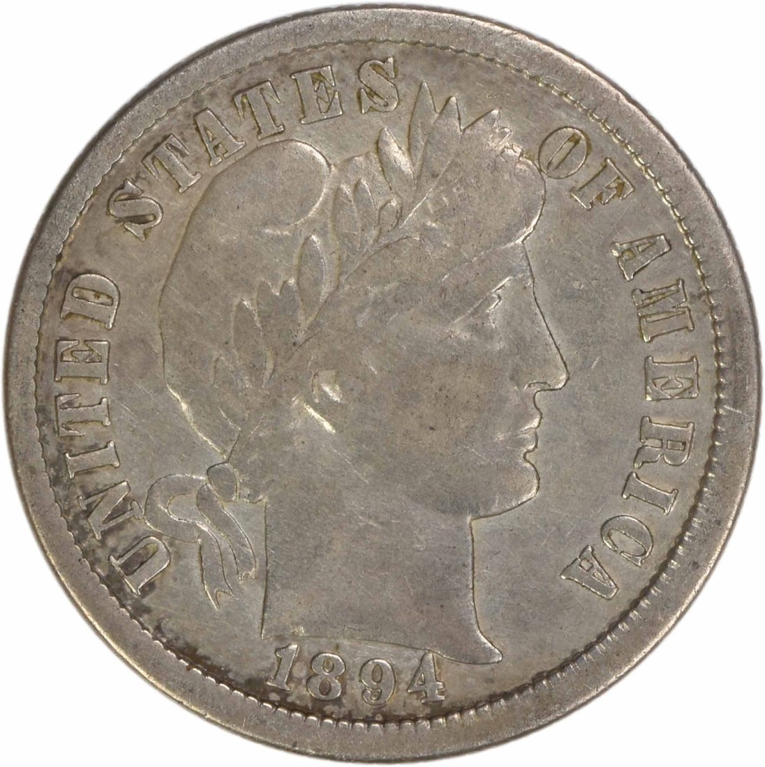 1894 New Orleans Mint Barber Dime 90 Percent Silver VF Uncertified: 1894 New Orleans Mint Barber Dime 90 Percent Silver VF Uncertified This 1894-O Barber Dime was minted in New Orleans and designed by Charles E. Barber. Composed of 90% silver and 10% copper, this circ