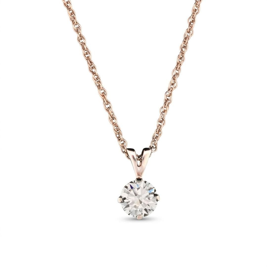 14K White Gold Round Brilliant Diamond Pendant: 14K White Gold Round Brilliant Diamond Pendant This vintage pendant features a natural round brilliant diamond weighing 0.63 carats, set in 14K white gold. The diamond has a color grade of I-J and a c