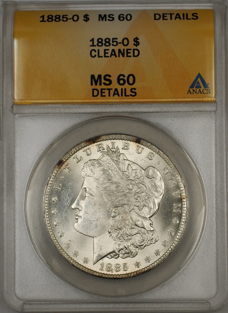ANACS MS-60 Details 1885-O Silver Dollar New Orleans Cleaned: ANACS MS-60 Details 1885-O Silver Dollar New Orleans Cleaned This 1885-O Morgan Silver Dollar is certified by ANACS with a grade of MS-60 Details. The coin has been cleaned and is uncirculated. Minted