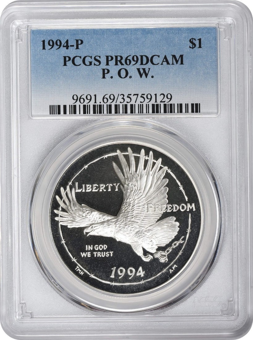 PCGS PR69DCAM 1994-P Silver POW Commemorative Dollar: PCGS PR69DCAM 1994-P Silver POW Commemorative Dollar This is a 1994-P POW (Prisoner of War) Silver Commemorative Dollar, struck in proof quality and graded PR69 Deep Cameo by PCGS. The coin is uncircu