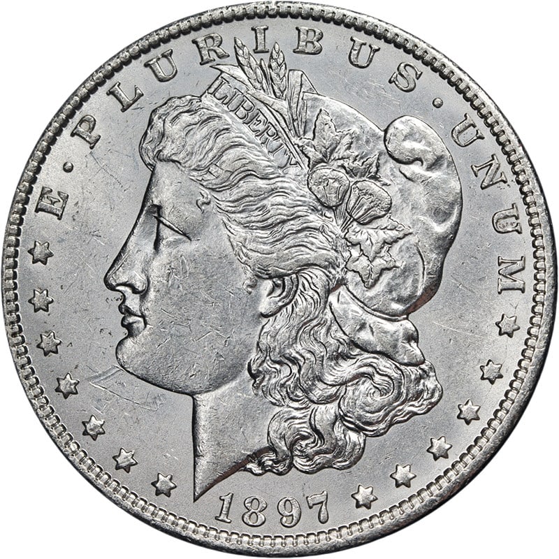 1897-O Morgan Silver Dollar Bright White Nice Strike Uncertified: 1897-O Morgan Silver Dollar Bright White Nice Strike Uncertified This 1897-O Morgan Silver Dollar is an uncirculated coin featuring attractive eye appeal, bright luster, and a strong strike. The coin 