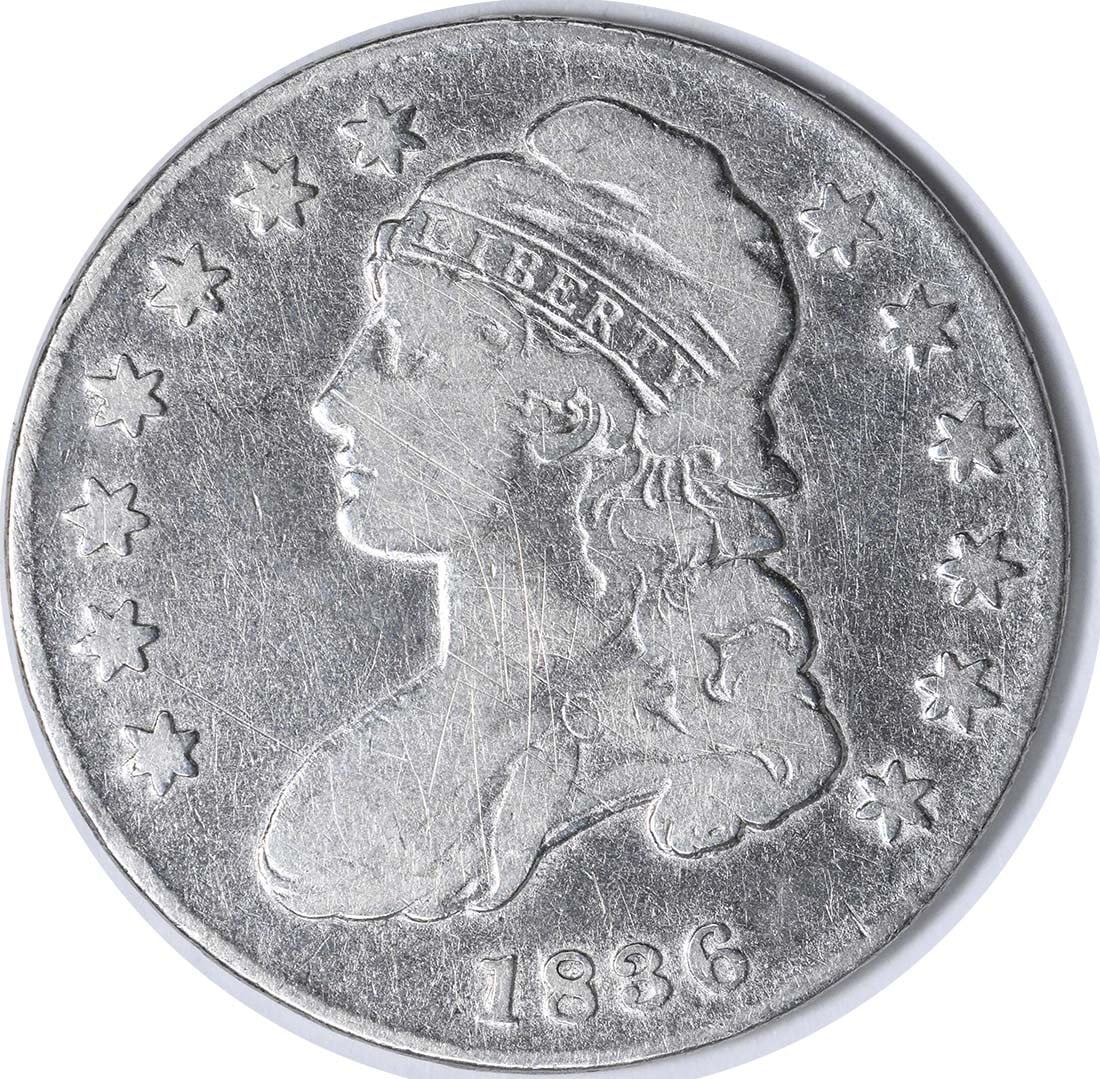 1836 Liberty Cap Half Dollar Lettered Edge F: 1836 Liberty Cap Half Dollar Lettered Edge F This 1836 Bust Silver Half Dollar features a lettered edge with the inscription "FIFTY CENTS OR HALF A DOLLAR." Struck in Philadelphia and designed by John