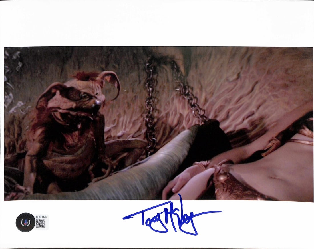 8x10 Signed Salacious Crumb Photo by Tony McVey with Beckett Authentication: 8x10 Signed Salacious Crumb Photo by Tony McVey with Beckett Authentication This is an original 8x10 color photograph signed in blue permanent marker by Tony McVey, the ILM sculptor and modeler known 