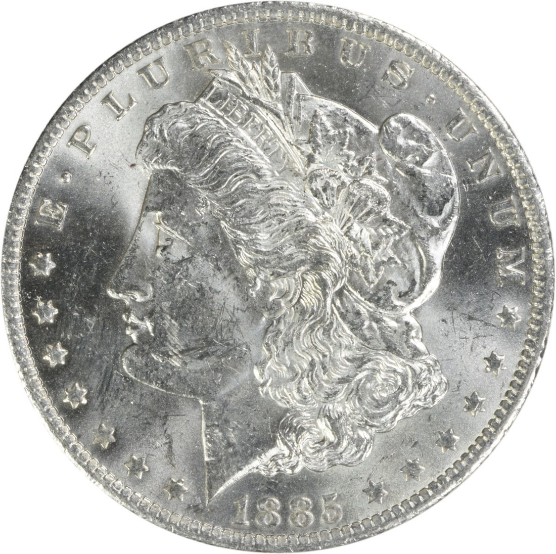 Uncirculated 1885 O Silver Dollar Morgan Brilliant Uncertified US Coin: Uncirculated 1885 O Silver Dollar Morgan Brilliant Uncertified US Coin This is an uncirculated 1885-O Morgan Silver Dollar from the United States. The coin is composed of silver and has a Brilliant Un