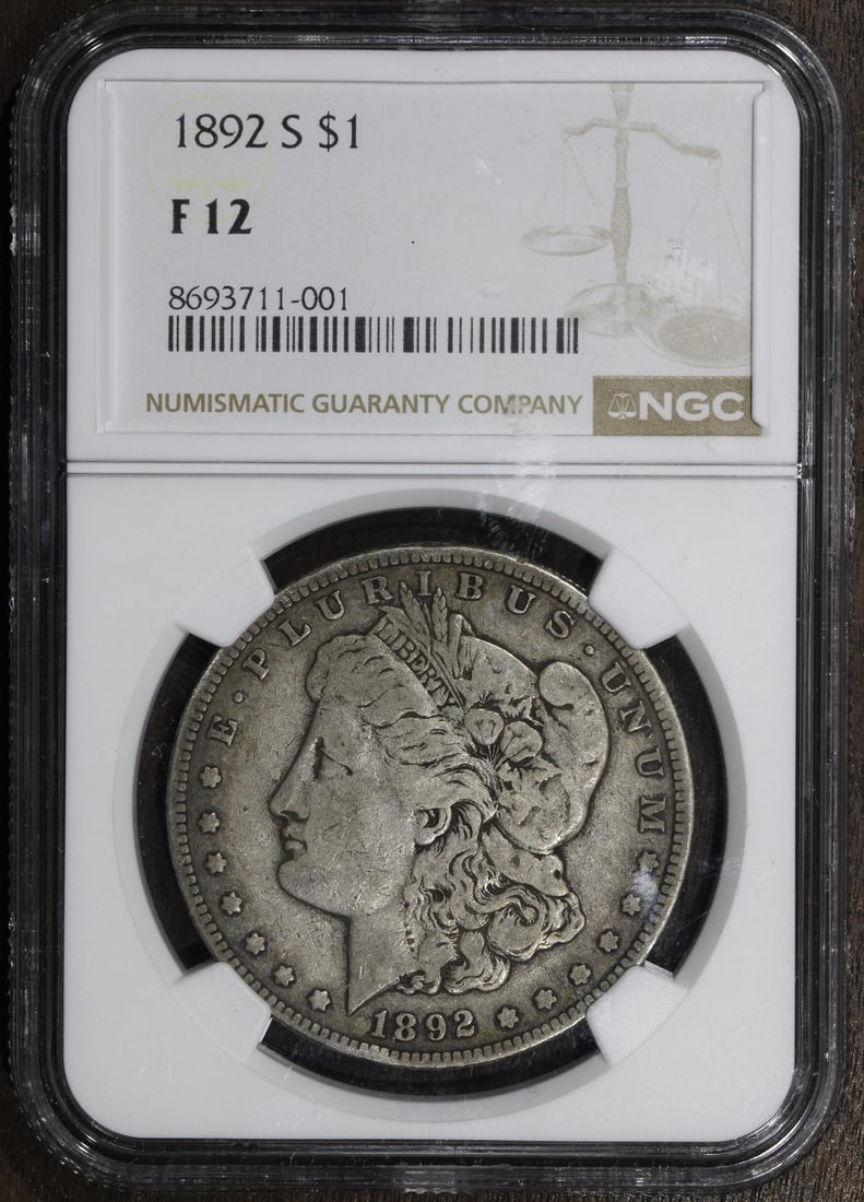 NGC Key Date 1892-S Morgan Silver Dollar F15: NGC Key Date 1892-S Morgan Silver Dollar F15 This is a circulated 1892-S Morgan Silver Dollar graded F15 by NGC. Struck in San Francisco, this key date coin is composed of 90% silver and has a denomin