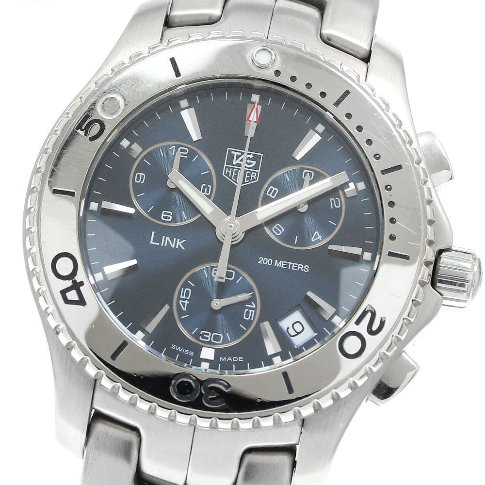 TAG Heuer Link CJ1112 Quartz Chronograph Date Men's Watch: TAG Heuer Link CJ1112 Quartz Chronograph Date Men's Watch This TAG Heuer Link Date Chronograph Quartz men's wristwatch, model CJ1112, features a stainless steel case and bracelet with a navy dial. The