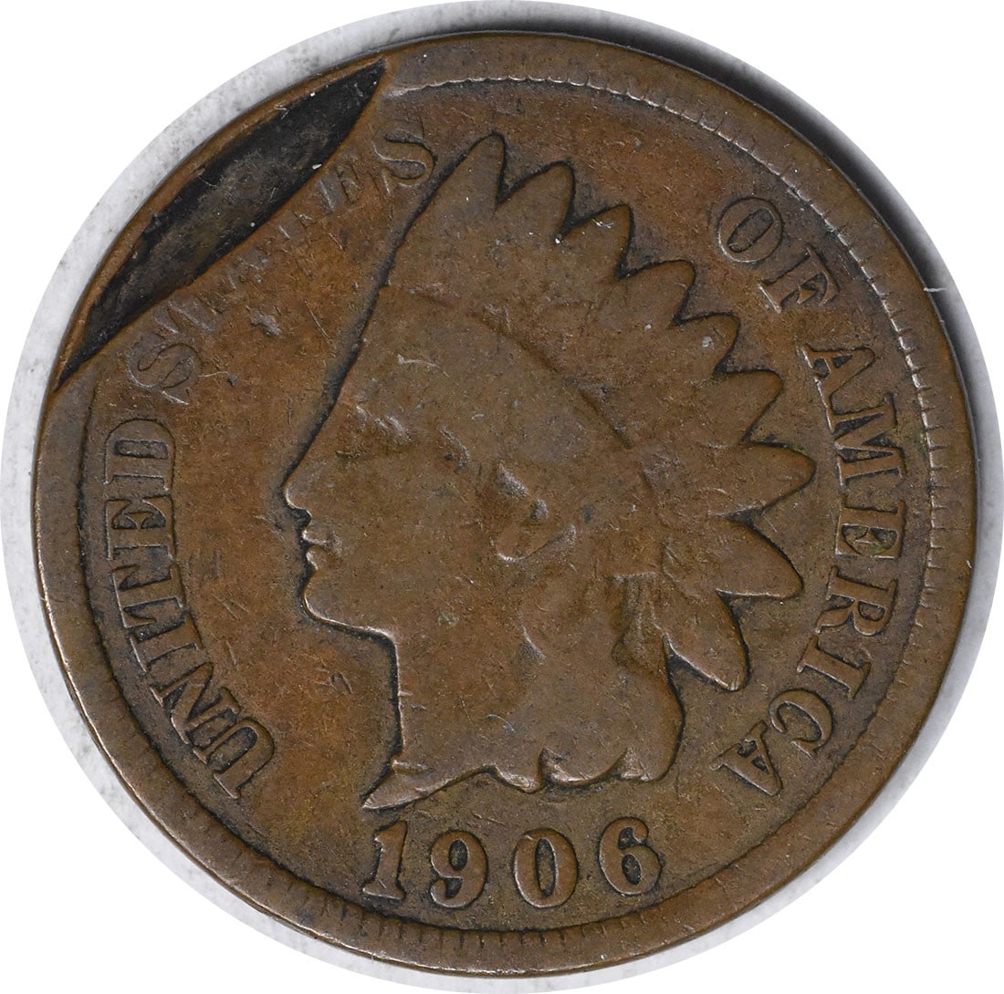 1906 Indian Head Copper Cent G Small Obverse Indent Uncertified: 1906 Indian Head Copper Cent G Small Obverse Indent Uncertified This 1906 Indian Head Cent is a circulated coin featuring a small obverse indent. Struck in copper, it represents the classic Indian Hea
