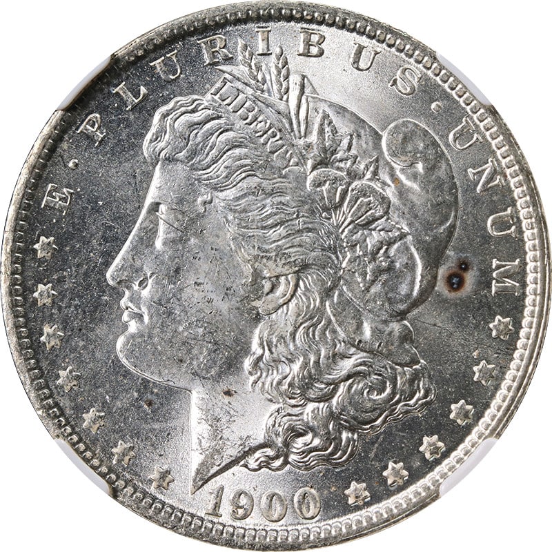 NGC MS63 1900-O Silver Morgan Dollar with Light Toning: NGC MS63 1900-O Silver Morgan Dollar with Light Toning This is a 1900-O Morgan Silver Dollar graded MS63 by NGC. The coin is composed of silver with a fineness of 0.9 and displays minimal toning. It o