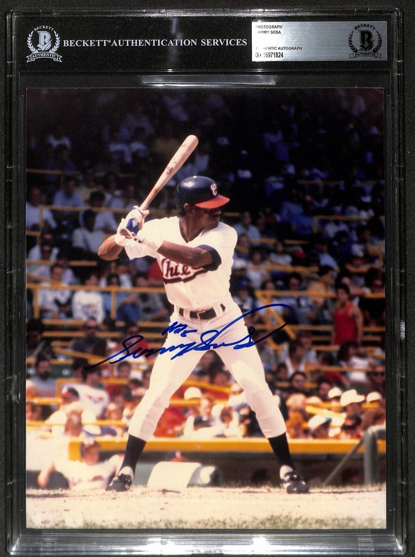 Sammy Sosa Signed 8x10 Photograph Beckett Authenticated Vintage: Sammy Sosa Signed 8x10 Photograph Beckett Authenticated Vintage This vintage 8x10 photograph features a striking image of former Chicago White Sox outfielder Sammy Sosa, personally signed by the playe