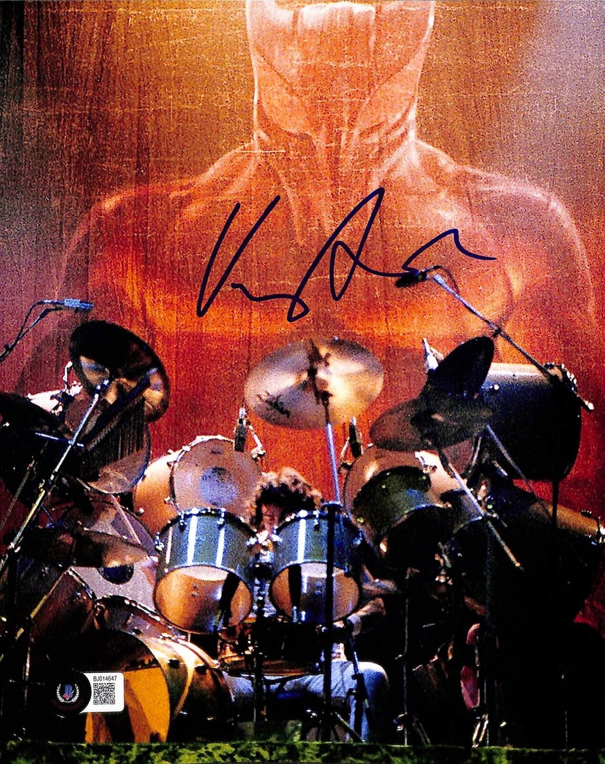 Vinny Appice Signed 8x10 Photo Certified by Beckett: Vinny Appice Signed 8x10 Photo Certified by Beckett Capture a piece of rock history with this autographed 8x10 photograph of legendary drummer Vinny Appice. Signed in blue permanent marker, this photo