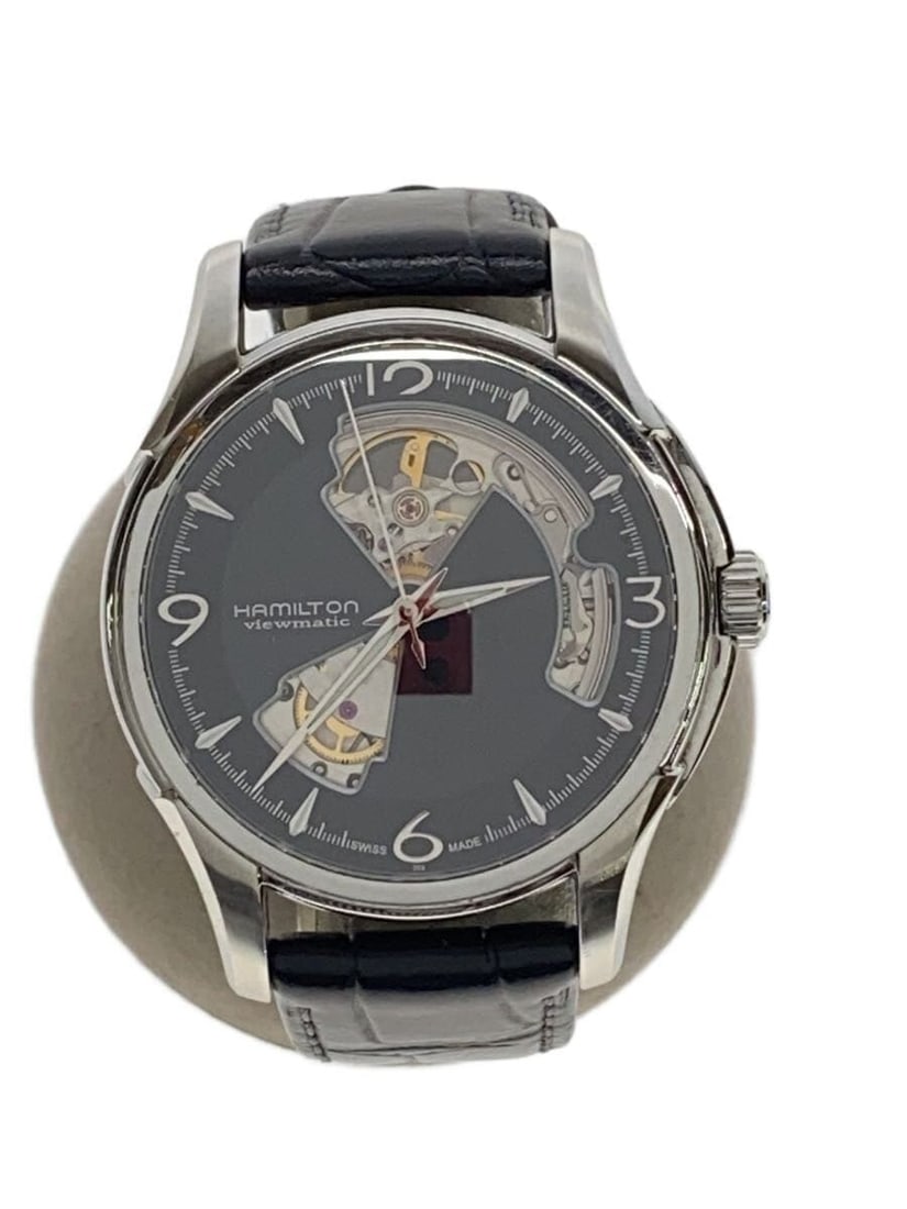 Hamilton Jazzmaster Open Heart black leather men's wristwatch: Hamilton Jazzmaster Open Heart black leather men's wristwatch This is a pre-owned Hamilton Jazzmaster Open Heart Automatic H325651 men's wristwatch. The watch features a black dial and a leather band,