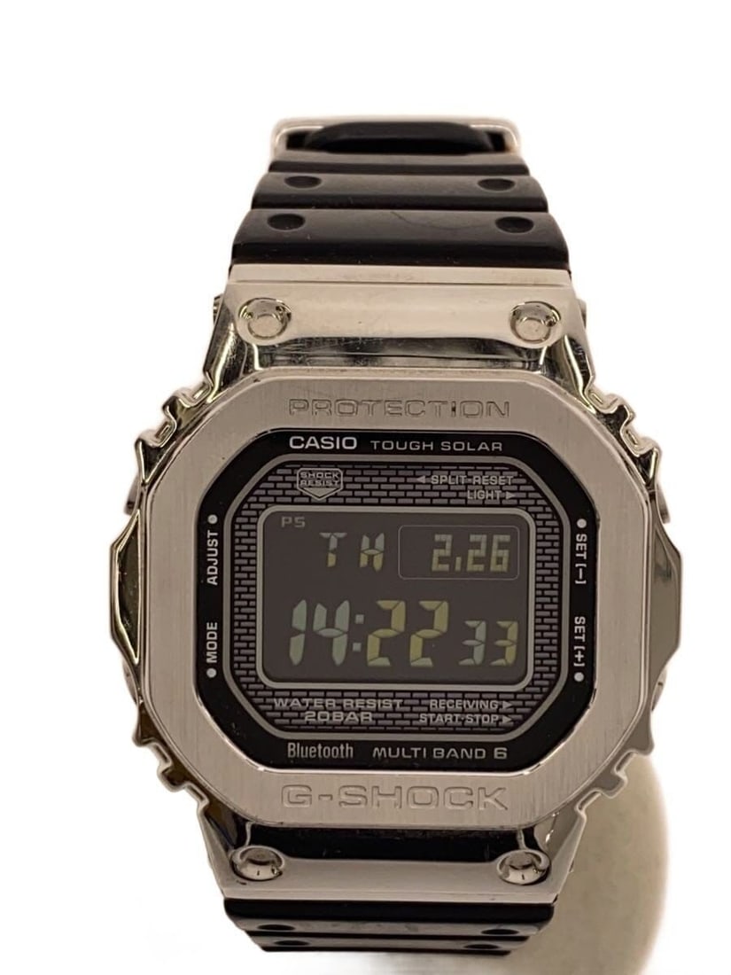 Casio G Shock GMW-B5000-1JF Silver Men's Wristwatch: Casio G Shock GMW-B5000-1JF Silver Men's Wristwatch This CASIO G-SHOCK GMW-B5000-1JF men's wristwatch features a silver-tone design and is crafted in Japan. The watch is pre-owned and graded as B, sho
