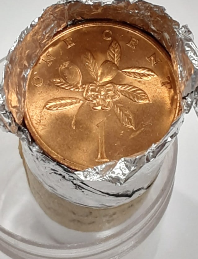 Roll of 35 Uncirculated 1969 Jamaica 1 Cent Bronze KM45 Coins in Wrapper: Roll of 35 Uncirculated 1969 Jamaica 1 Cent Bronze KM45 Coins in Wrapper This is a roll of 35 un-used 1969 Jamaica 1 Cent coins, KM#45, each minted in bronze. The coins are in brilliant uncirculated c