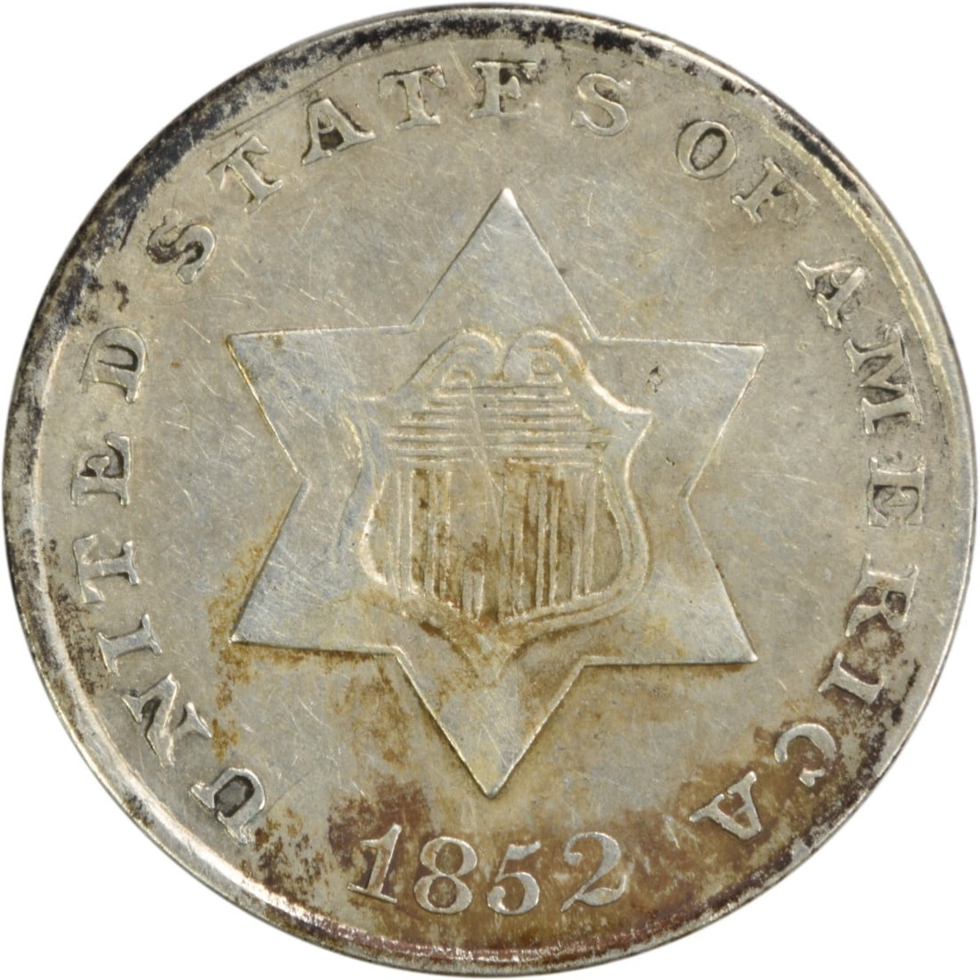 1852 United States silver three cent coin BU uncertified: 1852 United States silver three cent coin BU uncertified This 1852 Three Cent Silver coin from the United States is in Brilliant Uncirculated (BU) condition. It is composed of silver and is uncertifie
