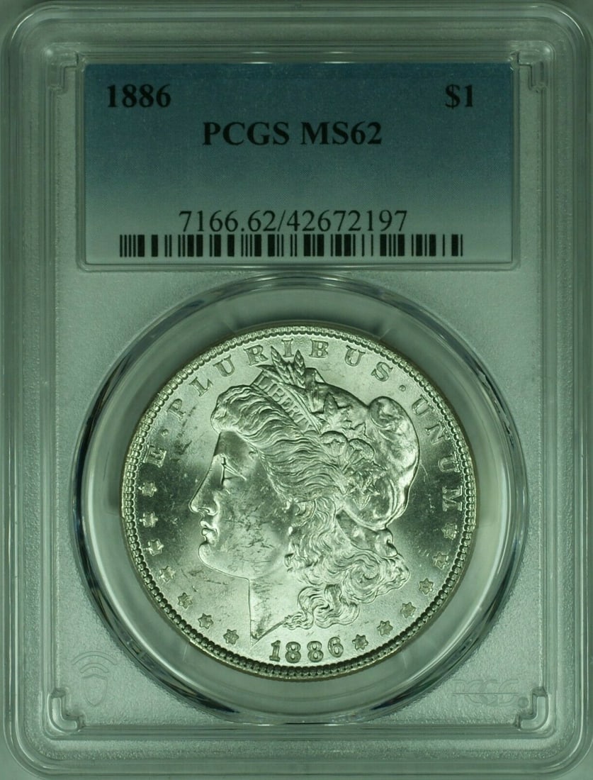 PCGS MS62 1886 Morgan Dollar Silver Coin Uncirculated Philadelphia Mint: PCGS MS62 1886 Morgan Dollar Silver Coin Uncirculated Philadelphia Mint This is an 1886 Morgan Silver Dollar coin from the United States, minted in Philadelphia. The coin is uncirculated and has been 