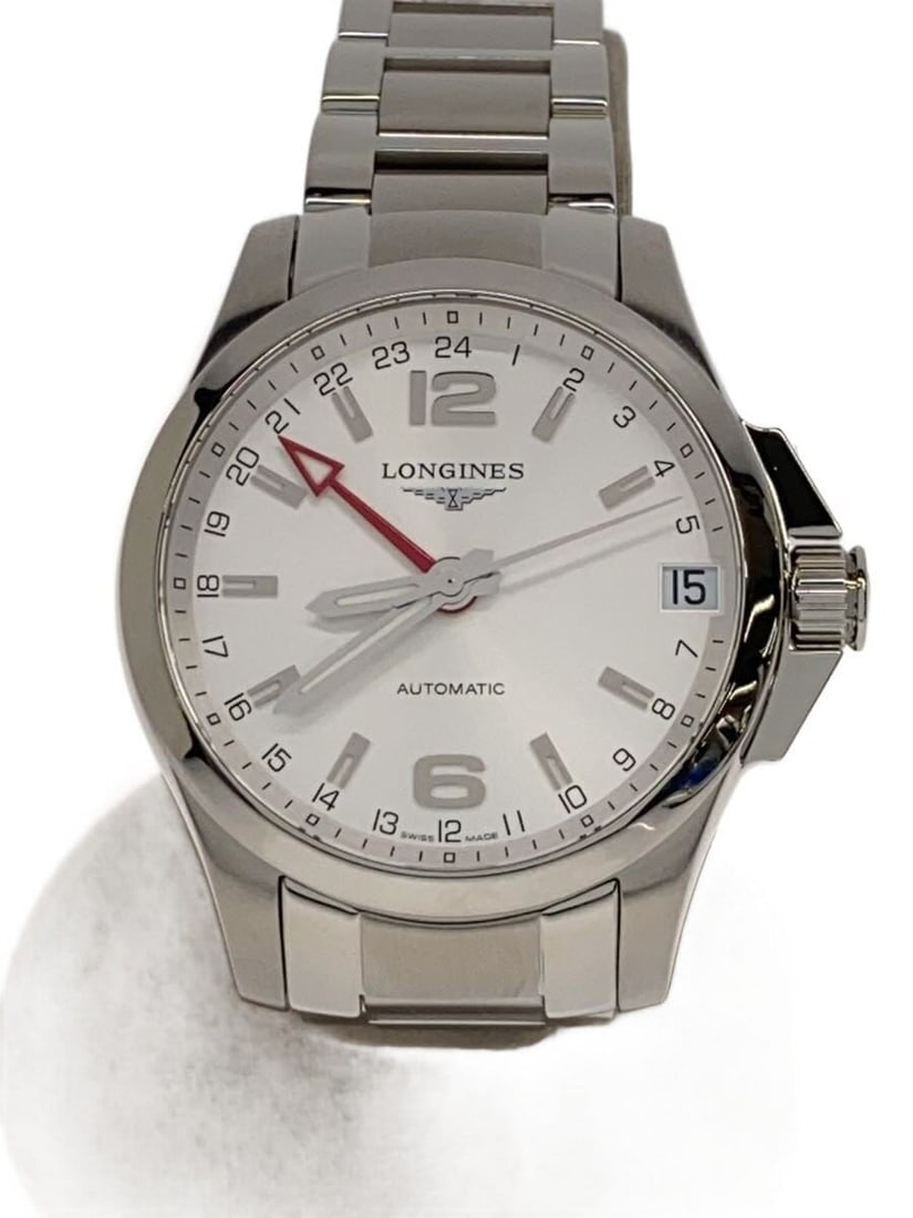 Longines Conquest Stainless Steel Men's Wristwatch: Longines Conquest Stainless Steel Men's Wristwatch This is a pre-owned LONGINES Conquest L3.687.4 men's wristwatch, crafted in Switzerland. The watch features a stainless steel case and band in a silv