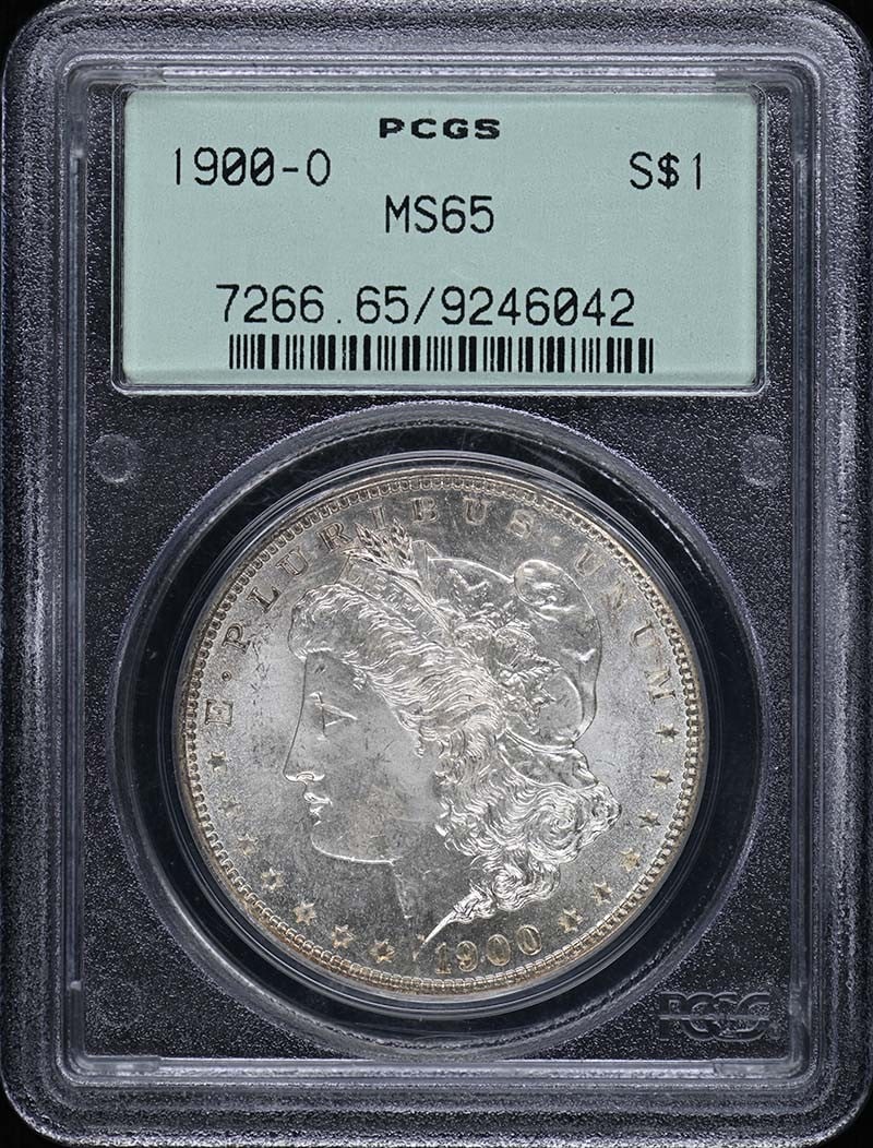 PCGS MS65 1900-O Morgan Dollar: PCGS MS65 1900-O Morgan Dollar This is a 1900 Morgan Dollar minted in New Orleans, graded MS65 by PCGS. The coin is uncirculated and comes with PCGS certification for authenticity and grading. It orig