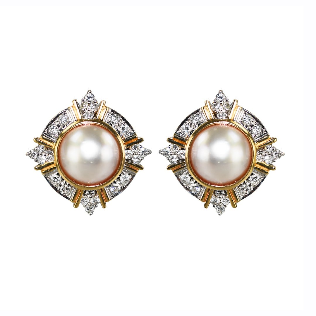 14k Yellow Gold Mabe Pearl Diamond Clip Back Earrings: 14k Yellow Gold Mabe Pearl Diamond Clip Back Earrings These elegant earrings feature lustrous mabe pearls set in 14k yellow gold, accented by sparkling diamonds with a total carat weight of 1.50ct. Th