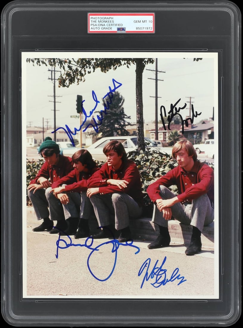 The Monkees Signed 8x10 Photo Auto PSA Gem Mint 10: The Monkees Signed 8x10 Photo Auto PSA Gem Mint 10 This stunning 8x10 photograph of The Monkees has been personally signed by all four members: Peter Tork, Davy Jones, Mickey Dolenz, and Michael Nesmi