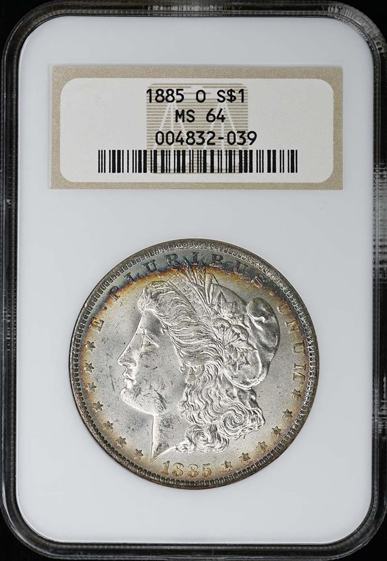NGC MS64 1885-O New Orleans Morgan Silver Dollar: NGC MS64 1885-O New Orleans Morgan Silver Dollar This is an 1885 Morgan Dollar from the New Orleans Mint, graded MS64 by NGC. The coin is uncirculated and comes with NGC certification. It is a pre-own