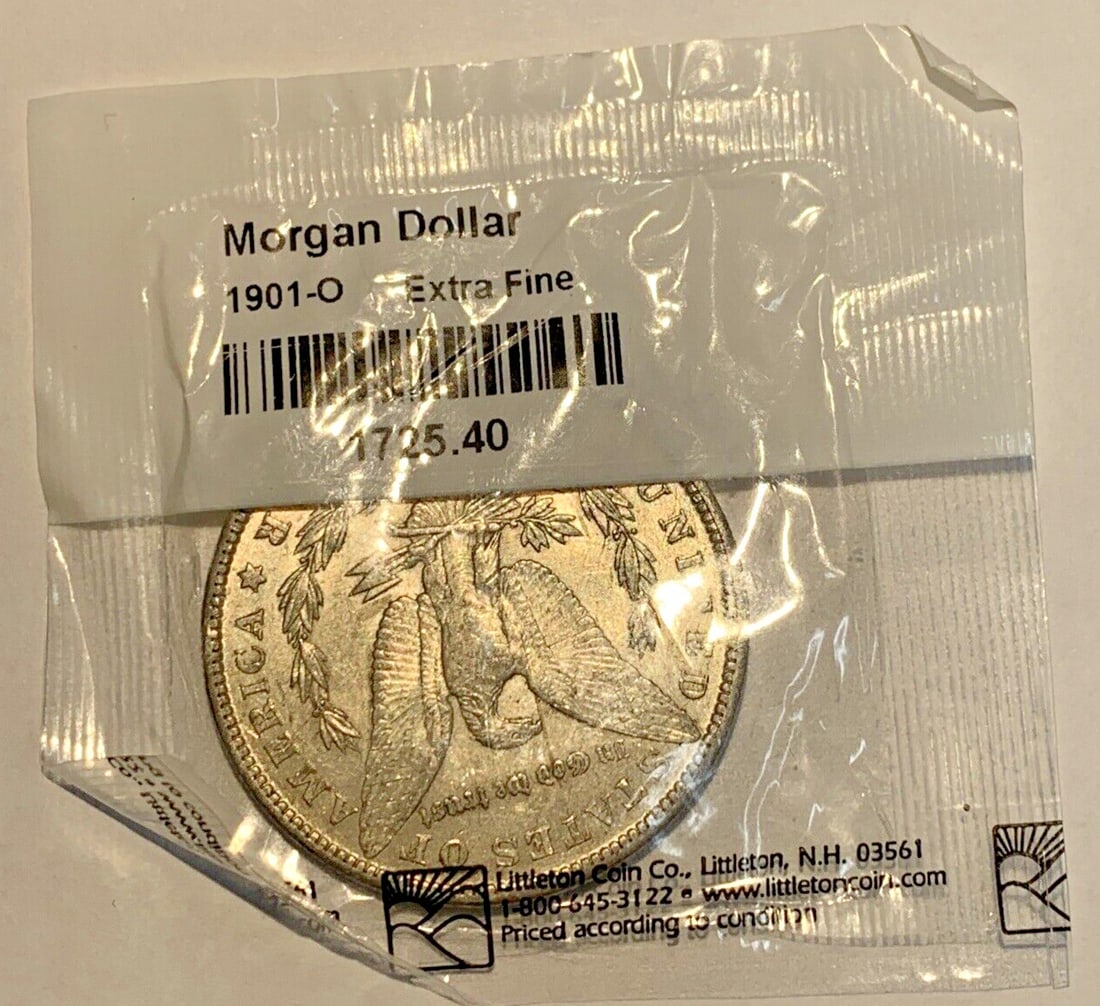 1901-O Morgan Dollar Silver Coin from New Orleans Mint XF: 1901-O Morgan Dollar Silver Coin from New Orleans Mint XF This 1901-O Morgan Silver Dollar is a circulated coin minted in New Orleans. It features the classic Morgan design and is composed of silver. 