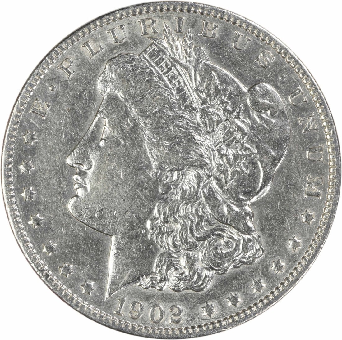 1902 O Morgan dollar AU uncertified New Orleans mint: 1902 O Morgan dollar AU uncertified New Orleans mint This 1902-O Morgan Silver Dollar is an ungraded, circulated coin from the New Orleans Mint. Designed by George T. Morgan, it features a composition