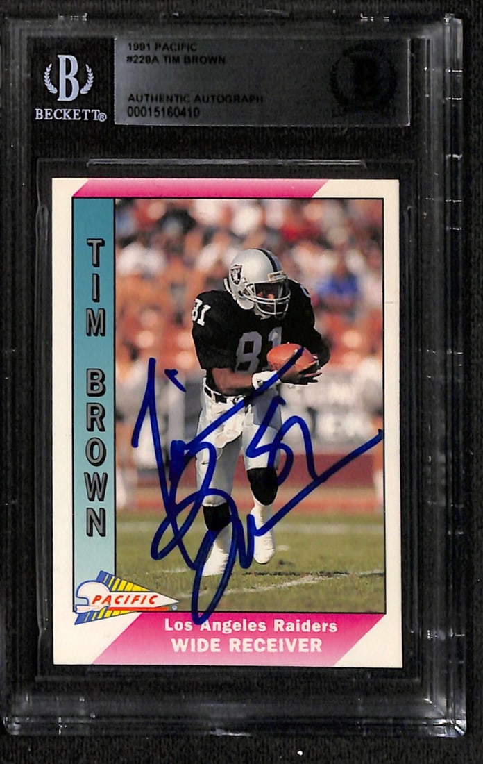 Tim Brown Signed 1991 Pacific #228A Football Card Beckett Authenticated: Tim Brown Signed 1991 Pacific #228A Football Card Beckett Authenticated This is a signed sports trading card featuring Tim Brown, a Hall of Fame member of the Los Angeles Raiders. The card is from the